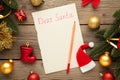 Letter to Santa Claus with Christmas decoration on grey background. Inscription Dear Santa Royalty Free Stock Photo