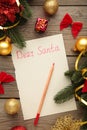 Letter to Santa Claus with Christmas decoration on grey background. Inscription Dear Santa. Vertical photo Royalty Free Stock Photo