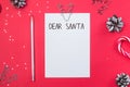 Letter to Santa Claus template. Empty paper with text Dear Santa and different decor on red background Royalty Free Stock Photo