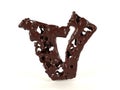 Letter V shaped liquid viscous chocolate