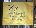 Letter X for Not a Letter in Bengali Turkish, Urdu and Arabic, vinyl banner, Immigrant Alphabet Project, Philadelphia