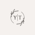 Letter YT wedding monogram logo design with simple natural circle leaf frame Royalty Free Stock Photo