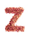 Letter Z made of dried rose petals, isolated on white background. Food typography, english alphabet. Design element Royalty Free Stock Photo