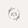 Letter ZS wedding monogram logo design with simple natural circle leaf frame Royalty Free Stock Photo