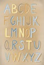Lettering. Capital letter. English. Alphabet. colorful ABC on the brown background