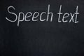 Lettering on a dark board Speech text Royalty Free Stock Photo