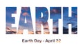 Lettering Earth Day April 22 on the background of sunset sky. Earth day concept, protection of the planet from pollution,