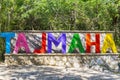 Lettering font symbol statue cave sinkhole cenote Tajma ha Mexico