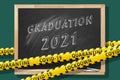 Graduation 2021. Lettering in a school blackboard. Covid-19 concept Royalty Free Stock Photo