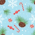 Christmas seamless pattern. White snowflake, red candy and lollipop on blue background. Branch of green coniferous, fir cones Royalty Free Stock Photo