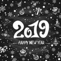 2019 New Years Greetings with Holiday Decorations on Black Chalk Royalty Free Stock Photo