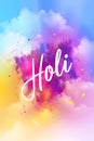 Lettering Holi on colorful abstract background. Colorful powder explosion, gulal powder. Festival of Colors Royalty Free Stock Photo