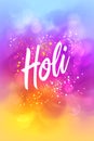 Lettering Holi on colorful abstract background. Colorful powder explosion, gulal powder. Festival of Colors Royalty Free Stock Photo