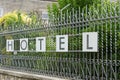 Lettering hotel on the fence of a hotel complex in Malcesine on Lake Garda in Italy