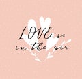 Lettering `Love is in the air` calligraphic font. Vector illustration with hand drawing italic inscription.