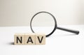 Lettering nav on wooden cubes on a gray background