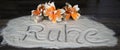 Lettering Ruhe in the sand Royalty Free Stock Photo