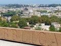 Lettering wall of the Italian Constitution with behind the panorama of Rome in Italy.