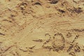 20 lettering written on sand Royalty Free Stock Photo