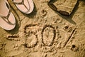 50 lettering written on sand Royalty Free Stock Photo