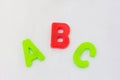 Letters abc on white background. learning alphabet with plastic toy, english language school