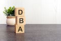 word dba made with wood building blocks Royalty Free Stock Photo