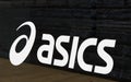 Letters asics on a wall i