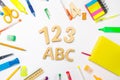 Letters A, B, C. numbers 1, 2, 3 on the school desk. concept of education. back to school. stationery. White background. stickers, Royalty Free Stock Photo