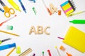 Letters A, B, C on the school desk. concept of education. back to school. stationery. White background. stickers, colored pens, pe Royalty Free Stock Photo