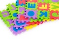 Letters and numbers colourful puzzle for children play. Soft toy