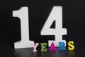 Letters and numbers fourteen on a black background. Royalty Free Stock Photo