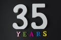 Letters and numbers thirty-five on the black background. Royalty Free Stock Photo
