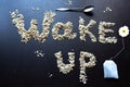 Letters of oatmeal lined with words Wake up