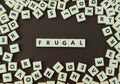 Letters spelling out frugal Royalty Free Stock Photo