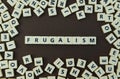 Letters spelling out frugalism Royalty Free Stock Photo