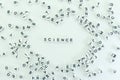 Letters spread on a surface with the word science displayed prominently among the random letters Royalty Free Stock Photo