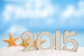 2015 letters with starfish, ocean ,white sand beach Royalty Free Stock Photo