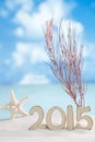 2015 letters with starfish, ocean ,white sand beach Royalty Free Stock Photo