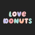 Lettering phrase: Love donuts, on a black background.