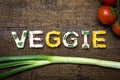 Letters of vegetable canapes builds the word veggie Royalty Free Stock Photo