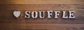 Letters on the wall. Interior decoration of letter written as souffle in capital letters. Long banner for website