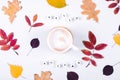 Letters words Hello Autumn and cup of coffee on grey background. Colorful autumn leaf. Flat lay Royalty Free Stock Photo