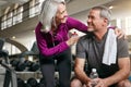 Letting healthy habits lead to true happiness. a mature couple working out together at the gym. Royalty Free Stock Photo
