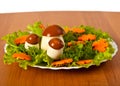 Lettuce and carrot cutting with mushroom.