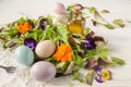 Lettuce and flower salad on woody white background spring, easter Royalty Free Stock Photo