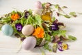 Lettuce and flower salad on woody white background spring, easter Royalty Free Stock Photo