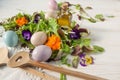 Lettuce and flower salad on woody white background spring, easter Royalty Free Stock Photo