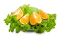 Lettuce and halfs of orange Royalty Free Stock Photo