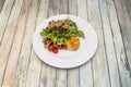 Lettuce salad with cherry tomatoes, California walnuts and raisins