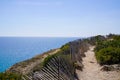 Leucate pathway wooden fence natural coast in french Occitanie south france Royalty Free Stock Photo